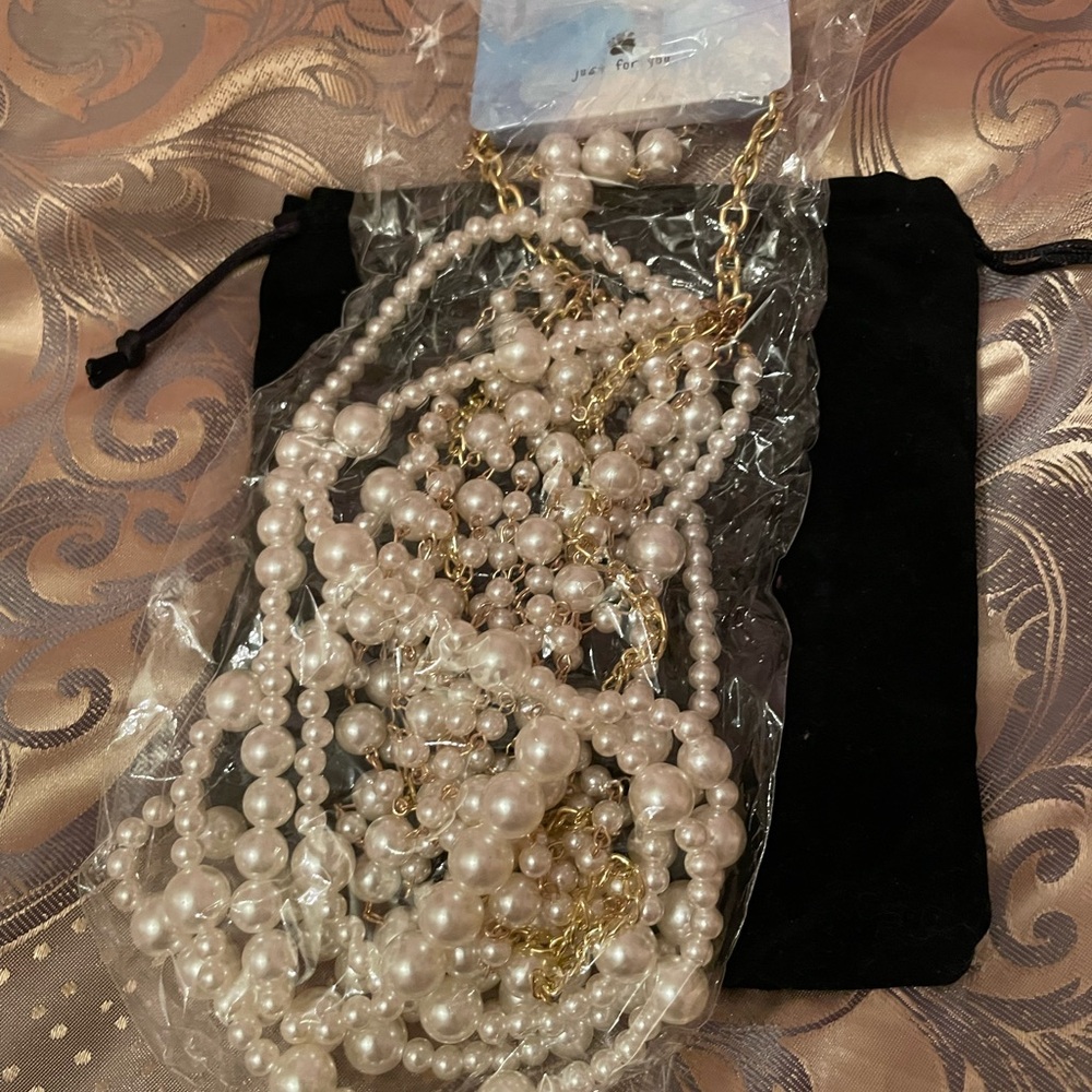 Beautiful faux pearl necklace with multiple strands plus earrings. New!